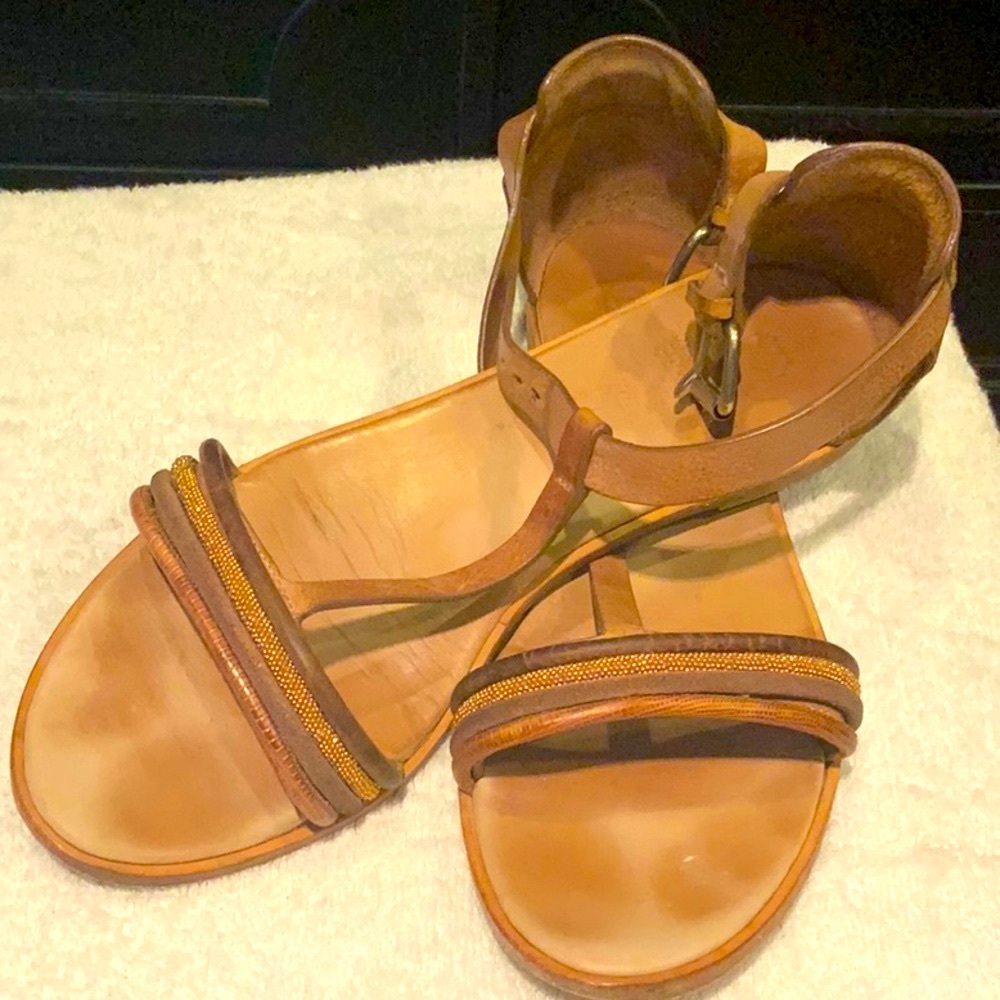 Brunello Cucinelli tan leather sandals w/buckled ankle strap and gold detail